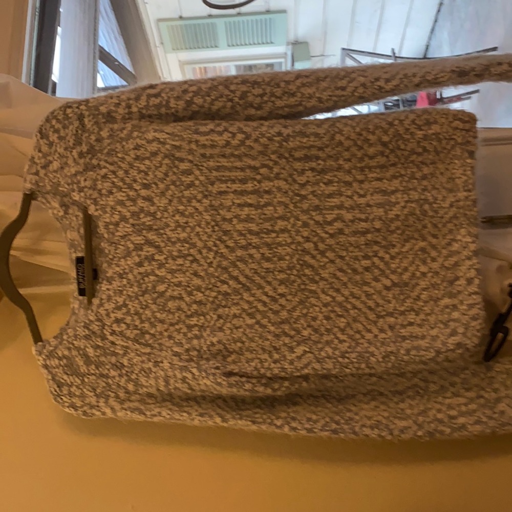 Soft blue and white sweater size small. In excellent condition never worn NWOT.